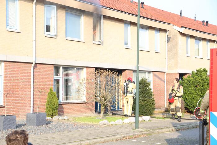 Brand in badkamer van woning