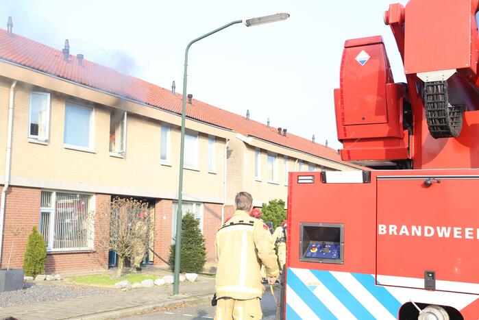 Brand in badkamer van woning