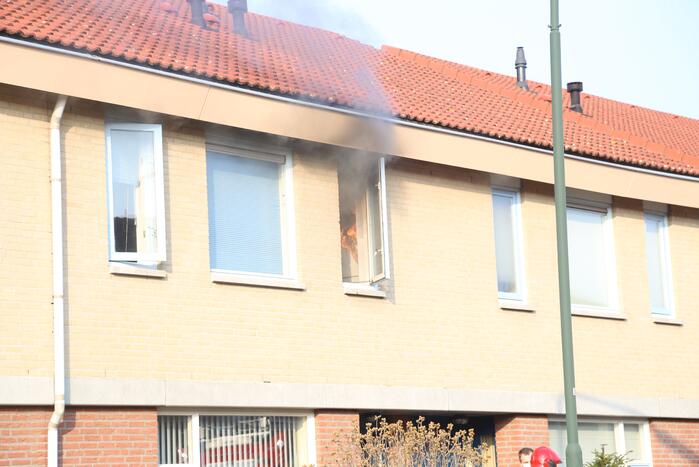 Brand in badkamer van woning