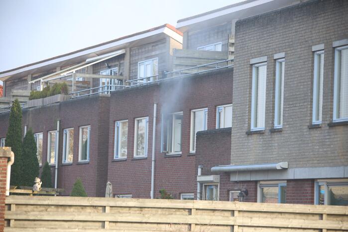 Brand in badkamer van woning
