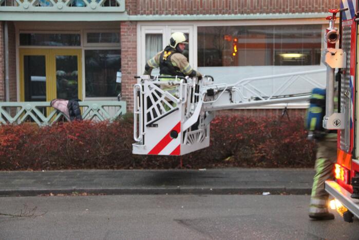 Brand in een trappenhuis van flatgebouw