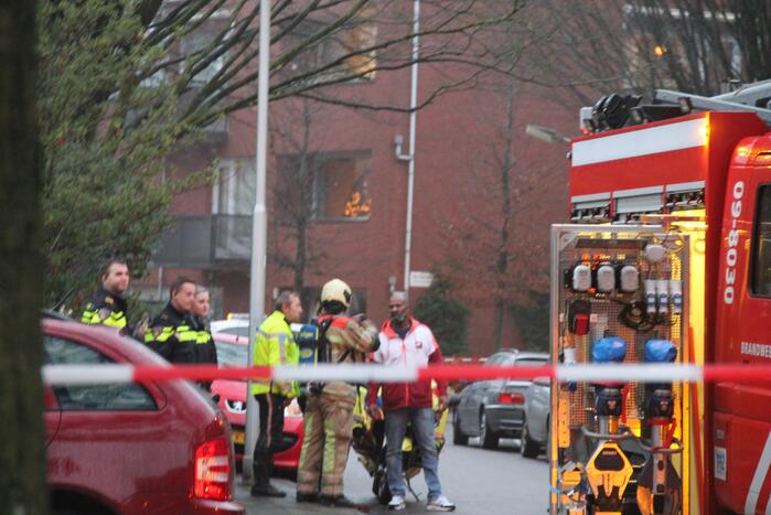 Brand in een trappenhuis van flatgebouw