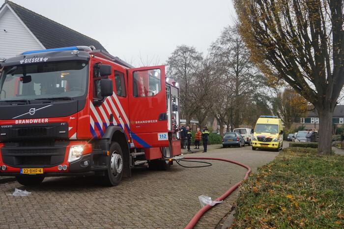Brand in garage naast woning