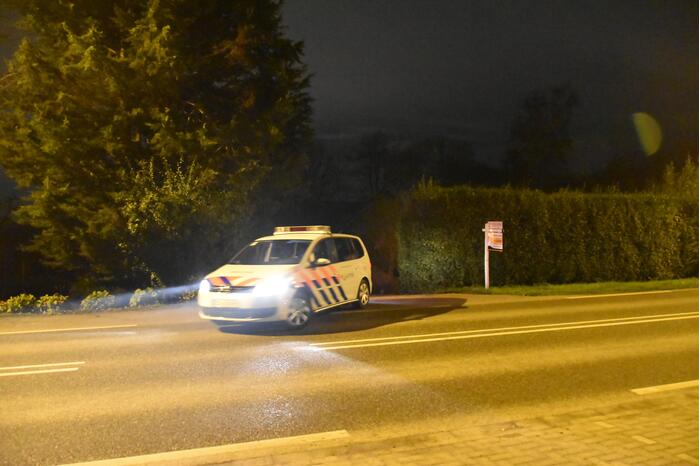 Aanhouding bij te koop staande woonboerderij