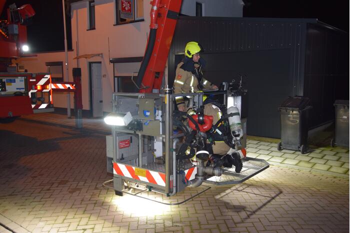Schoorsteen geveegd na brand