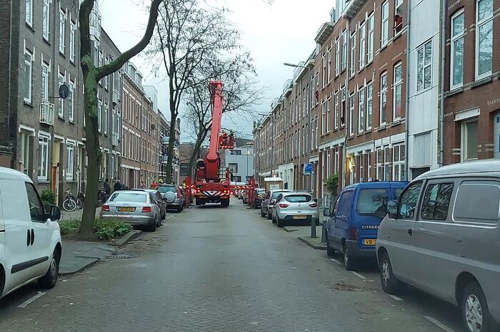 Persoon van dak gehaald