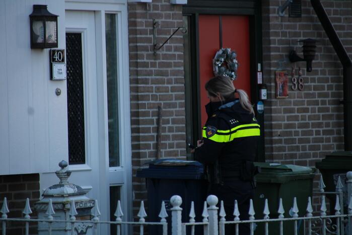 Voordeur woning verwoest door vuurwerkbom
