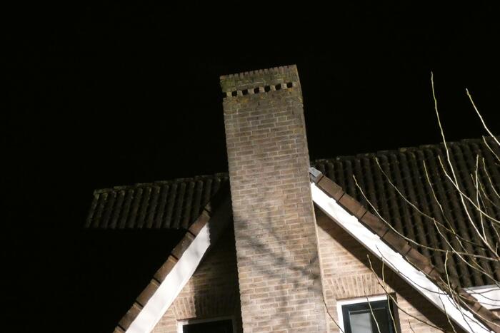 Schoorsteen geveegd na brand