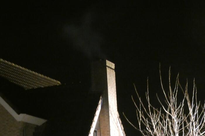 Schoorsteen geveegd na brand