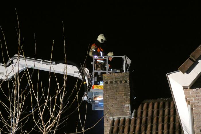 Schoorsteen geveegd na brand