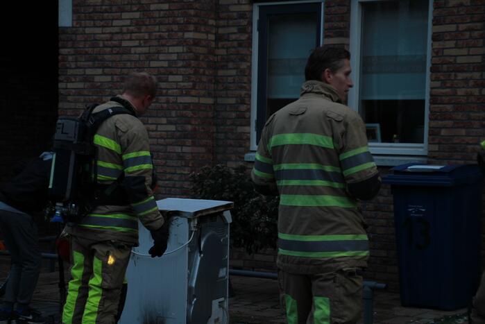 Wasdroger in brand in woning