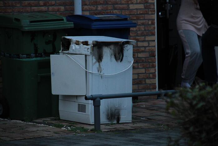 Wasdroger in brand in woning