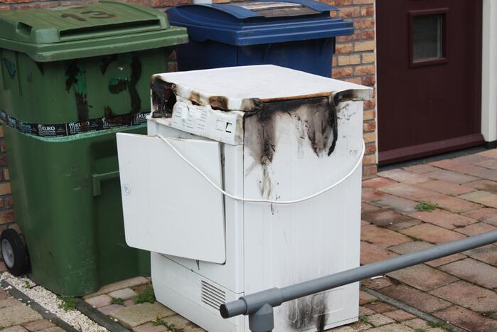 Wasdroger in brand in woning