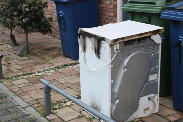 Wasdroger in brand in woning