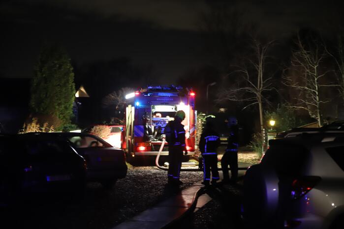 Flinke brand in houten chalet