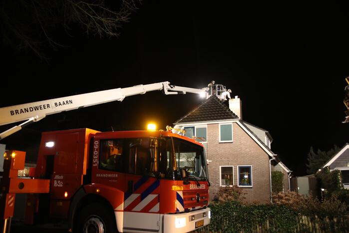 Brand in schoorsteen van woning