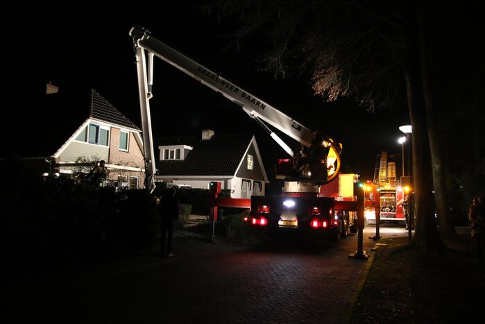 Brand in schoorsteen van woning