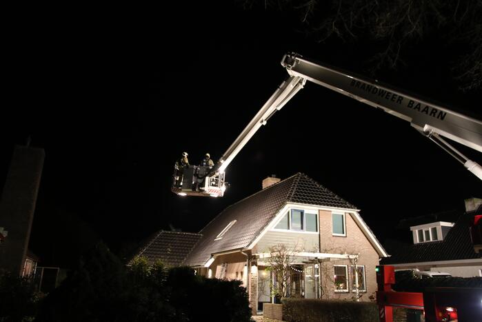 Brand in schoorsteen van woning