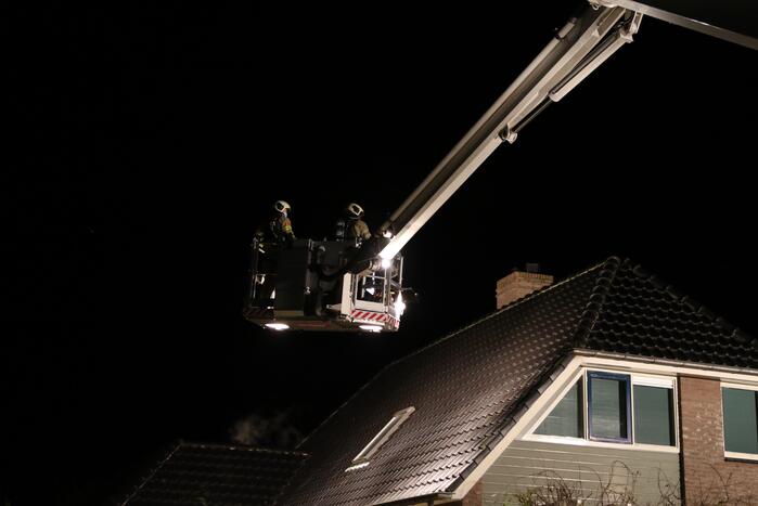 Brand in schoorsteen van woning