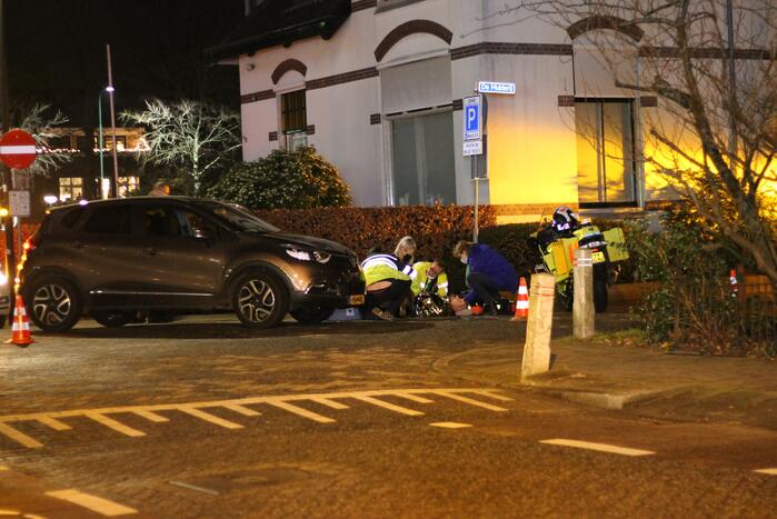 Voetganger met hond aangereden