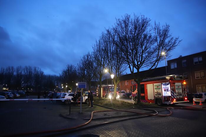 Appartementencomplex vol rook door brand