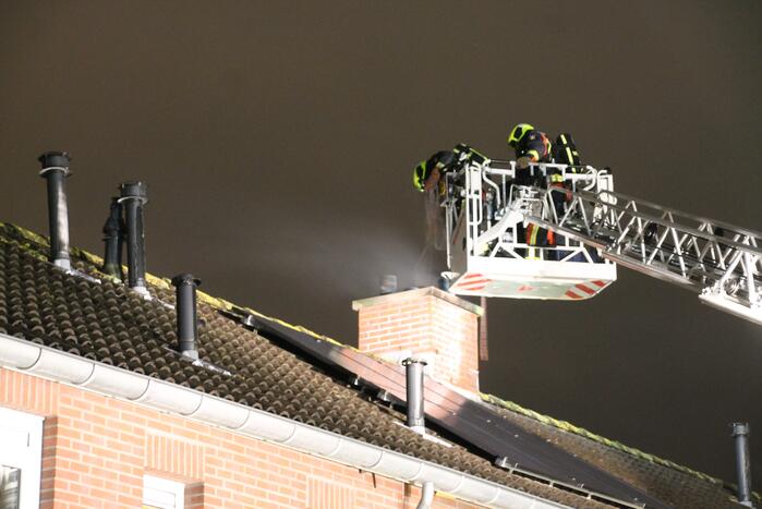 Uitslaande brand in schoorsteen