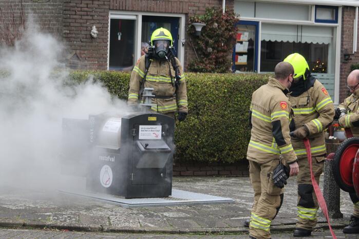 Brand in ondergrondse container snel geblust
