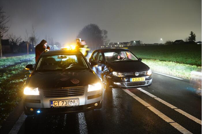 Schade na botsing tussen twee voertuigen