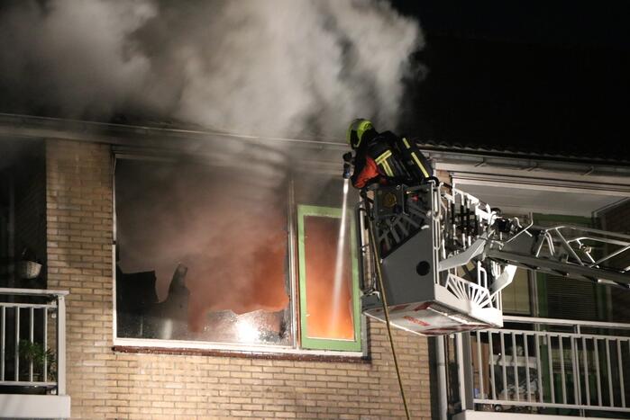 Flinke uitslaande brand in woning