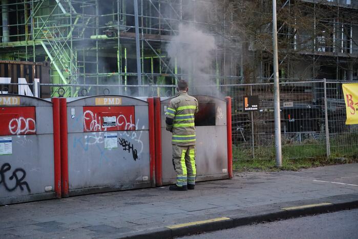 Brand in plastic container snel geblust