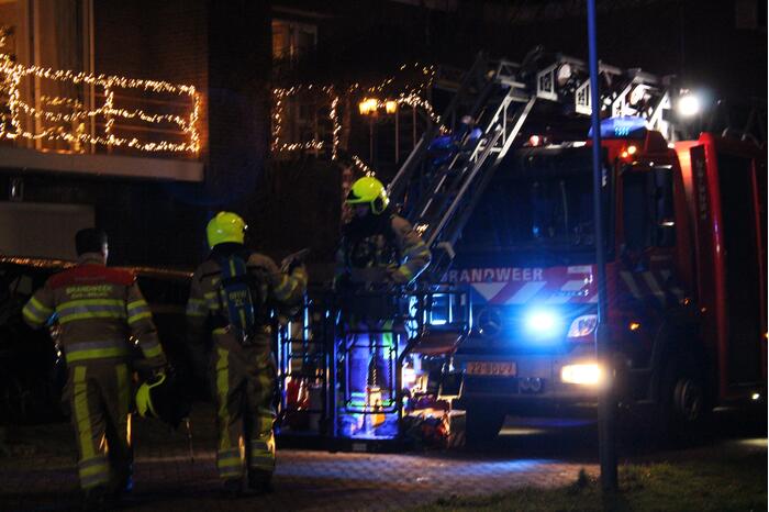 Brand in schoorsteen van woning