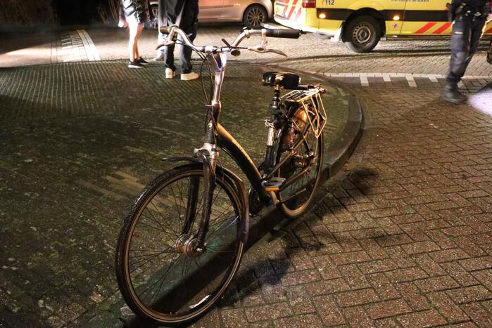 Fietser geschept door bestelbus