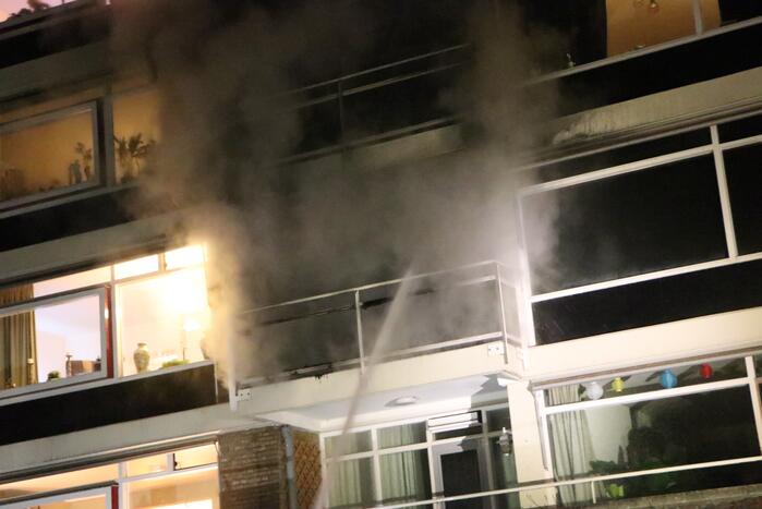 Uitslaande brand in flatwoning