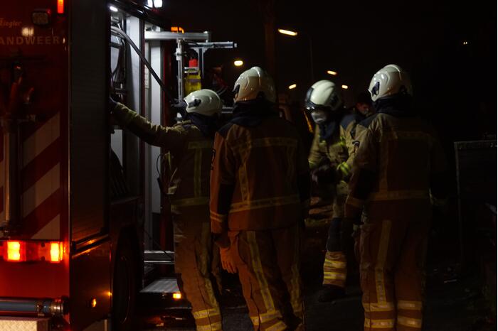 Afvalbrand in bosgebied