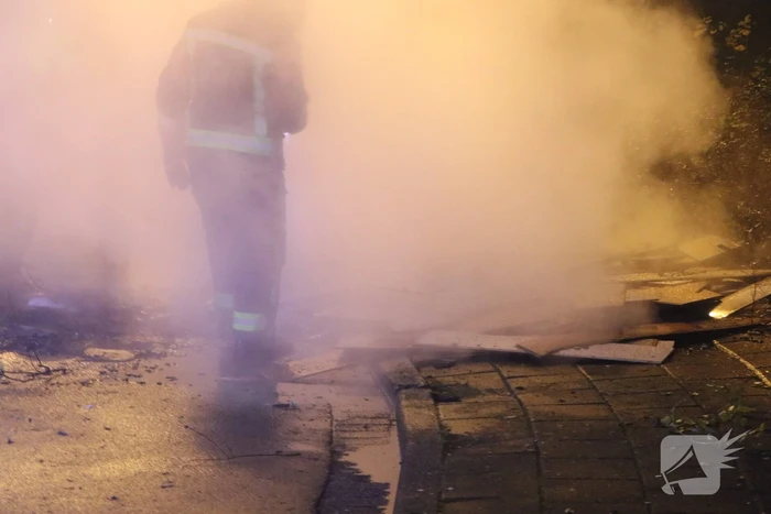 Stapel hout in brand gestoken