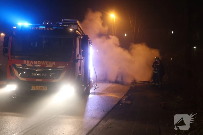 Stapel hout in brand gestoken