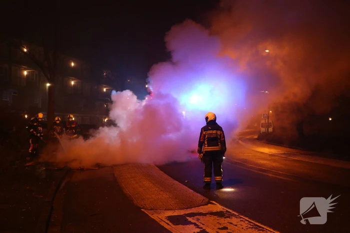 Stapel hout in brand gestoken
