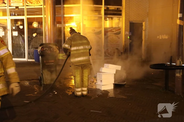 Brand in stapel karton