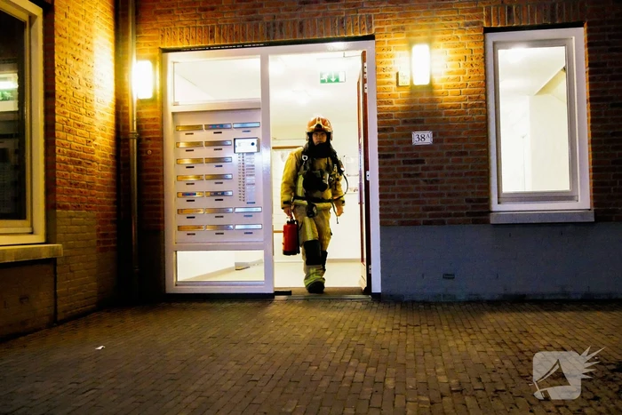 Deur opgebroken vanwege vlam in de pan