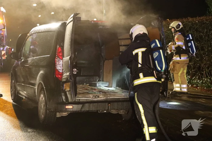 Forse schade na brand in bestelbus