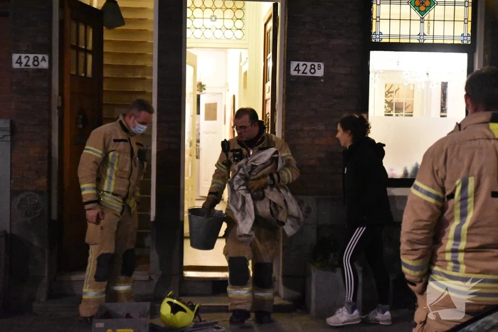 Opgehoopt roet in schoorsteen zorgt voor brand