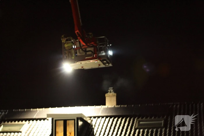 Brand in schoorsteen van woning