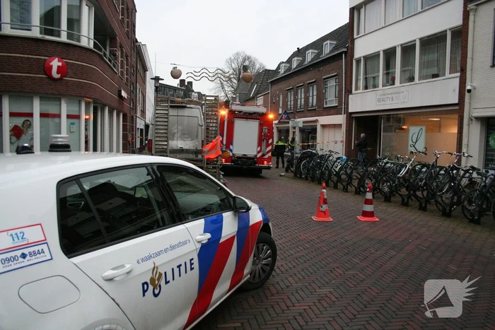Gaslekkage in winkelstraat