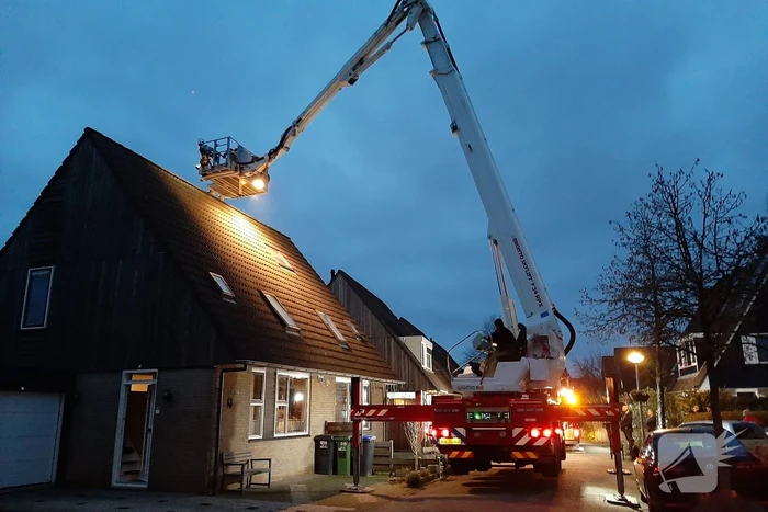 Brand in schoorsteen van woning
