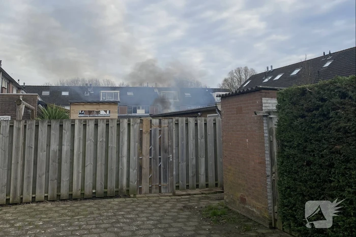 Schutting flink beschadigd door brand