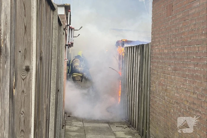 Schutting flink beschadigd door brand