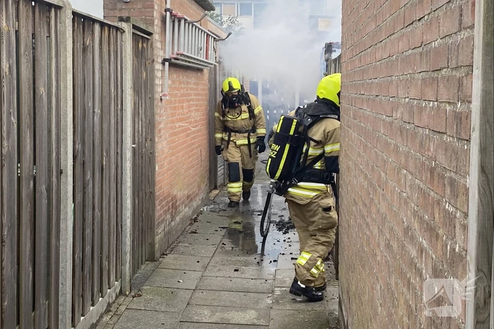Schutting flink beschadigd door brand