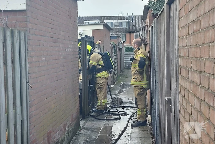 Schutting flink beschadigd door brand