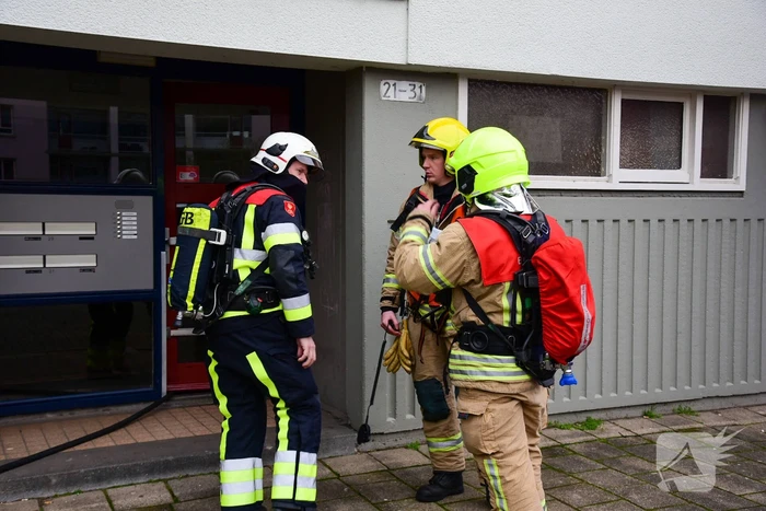 Meerdere flatwoningen ontruimd door brand