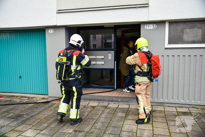 Meerdere flatwoningen ontruimd door brand